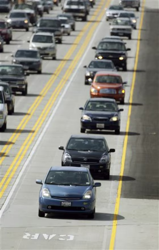 On Friday, a program that allowed drivers of hybrids with no passengers to use carpool lanes will end. The change is expected to affect some 85,000 owners of the vehicles in Calfornia.